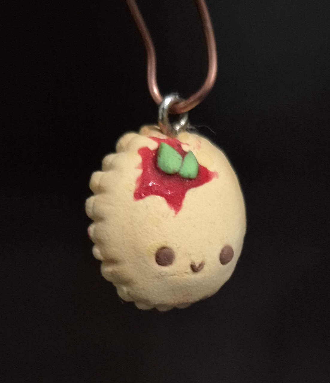 picture of a small clay ravioli charm