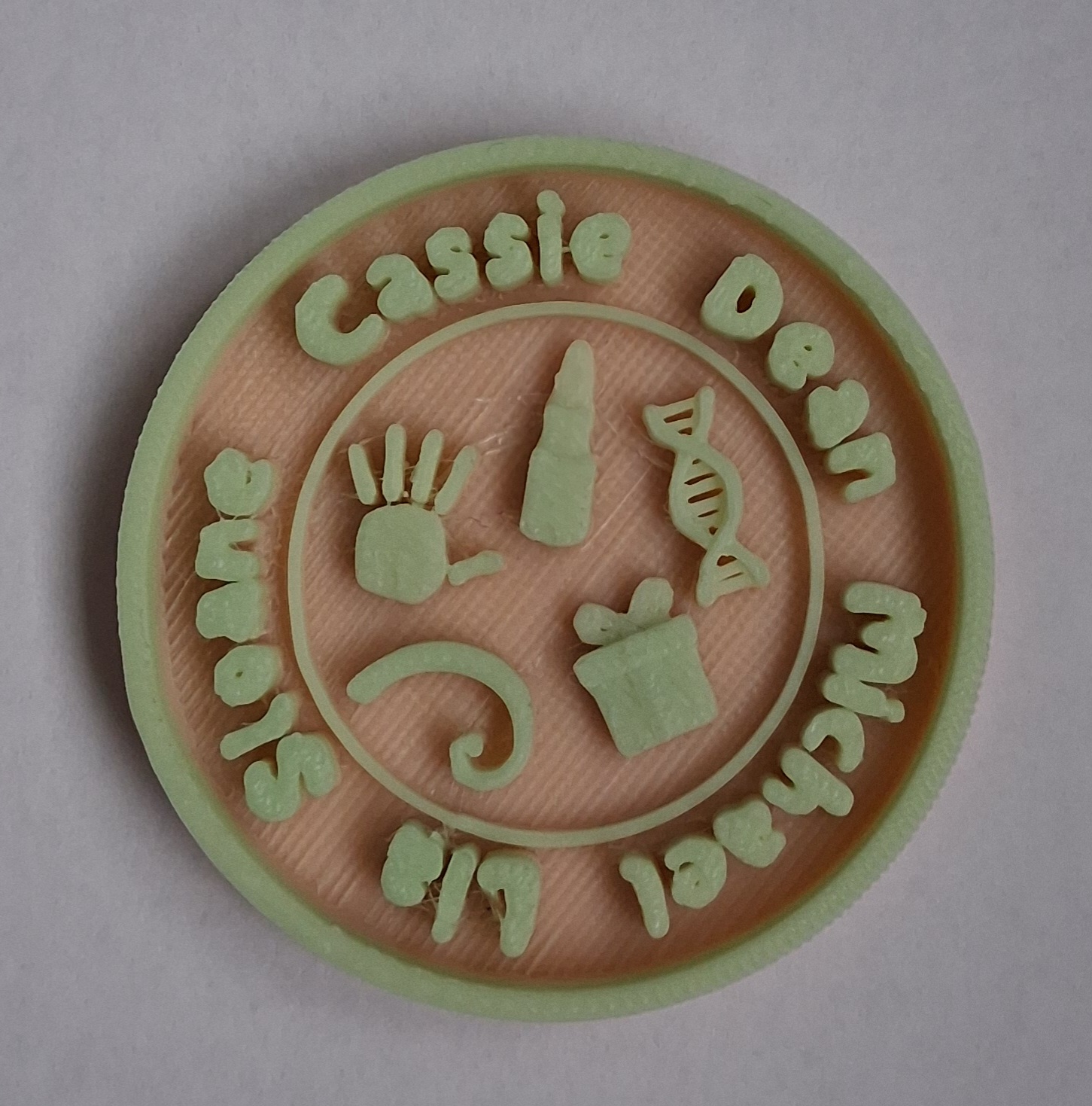 a picture of a 3D printed coin about the Naturals series