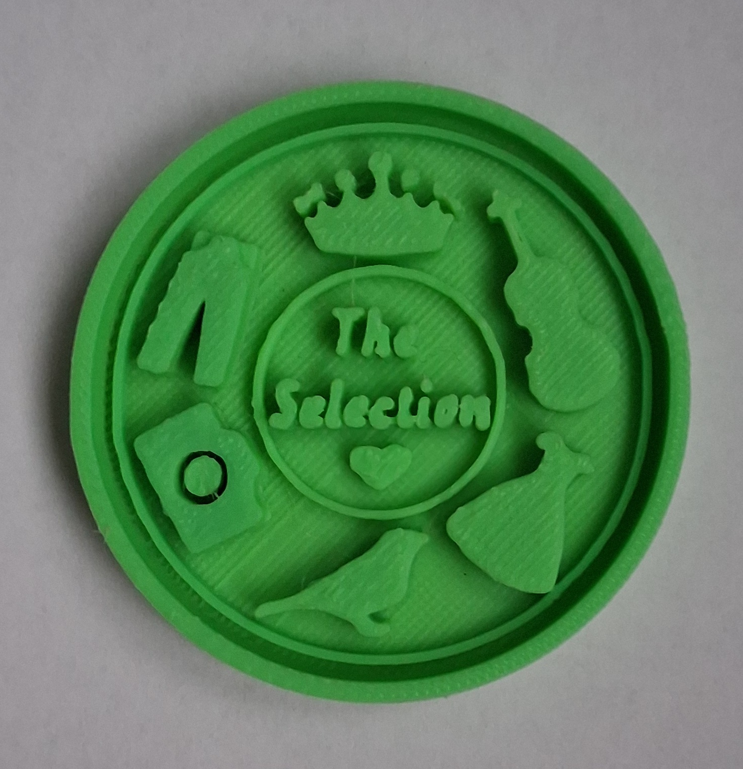a picture of a 3D printed coin about the Selection series
