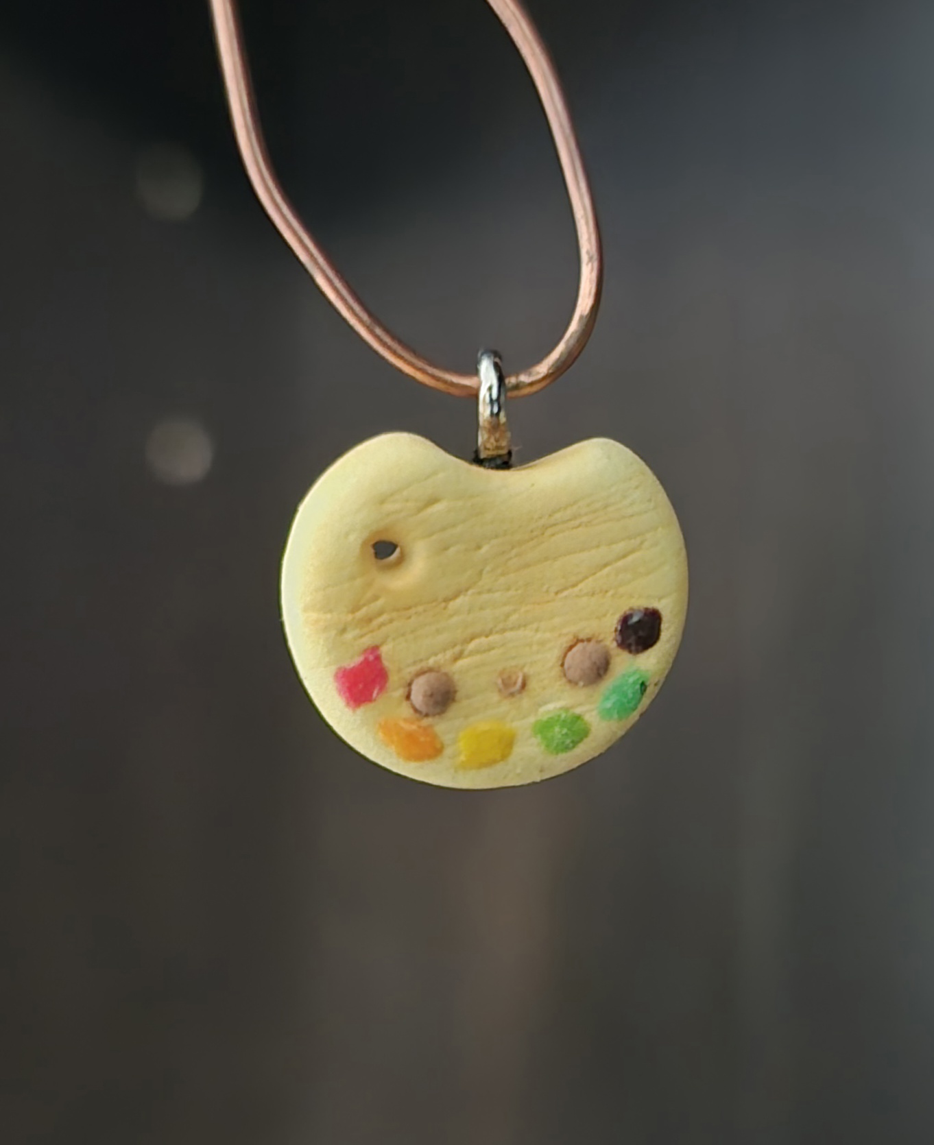 picture of a small clay palette charm